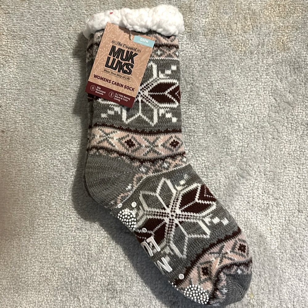 Fuzzy warm socks with grippers on the bottom